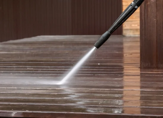 man-cleaning-walls-and-floor-with-high-pressure-po-2026-03-24-07-06-28-utc